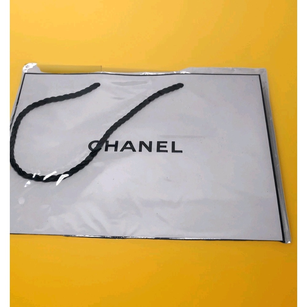 Chanel Medium Paper gift bag. 8" X 10" Plastic Sealed New